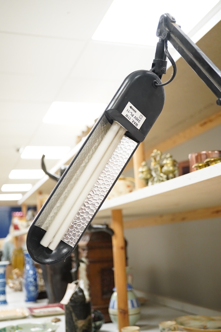 A vintage cast iron anglepoise desk lamp